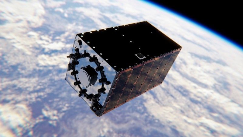 Wizualizacja satelity PIAST na orbicie okołoziemskiej.