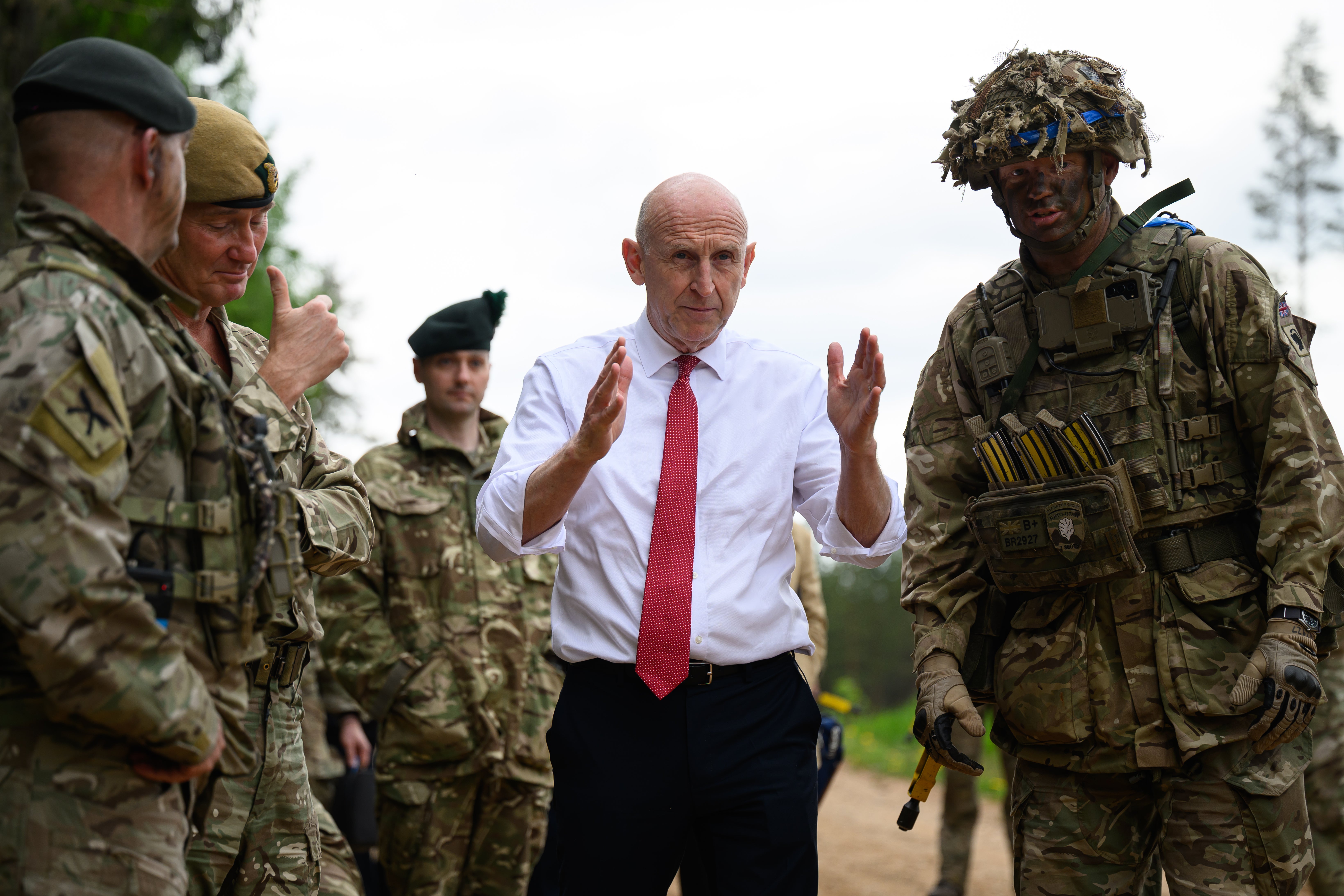 Defence secretary John Healey speaks with armed forcespersonnel as Allied Forces participate in Exercise Spring Storm near Voru, Southern Estonia