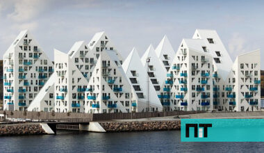 O incrível complexo residencial com vista para o mar que recria a forma de um icebergue — NiT