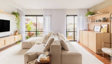 Tons claros, beges e texturas naturais criam atmosfera boho suave neste apê