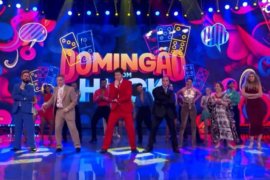 Luciano Huck cumpre desafio e dança hit do Dominó - 26/10/2025 - Celebridades