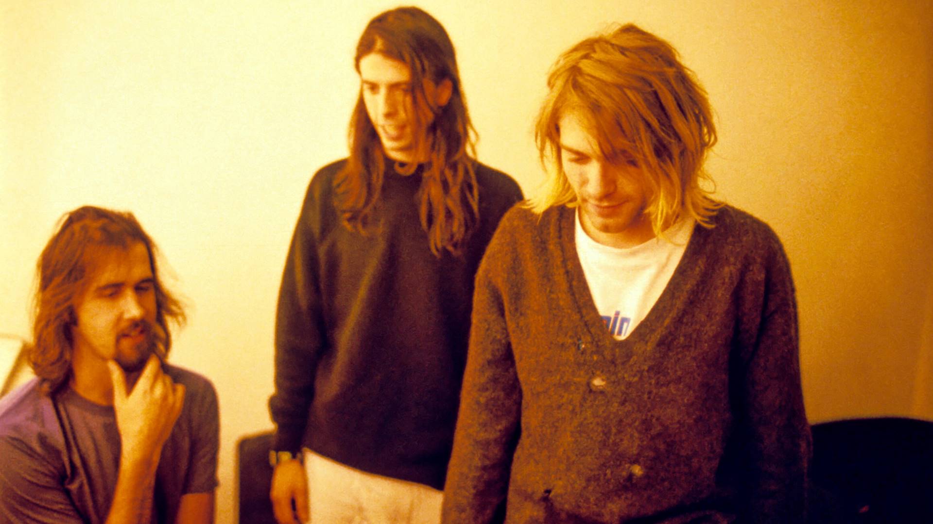 Nirvana em 1991 (E-D): Krist Novoselic, Dave Grohl e Kurt Cobain
