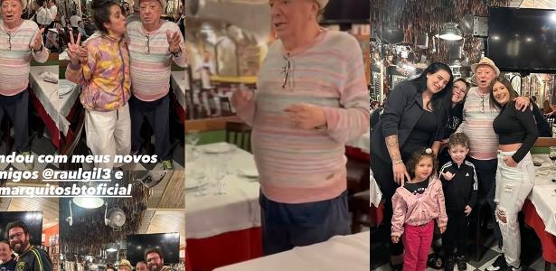 Raul Gil posa com fãs em restaurante após internação