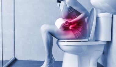 Uma silhueta humana com a região abdominal iluminada em vermelho (sinalizando inflamação/bloqueio).