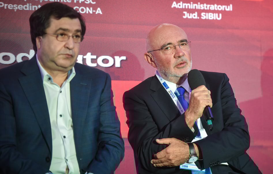 Erbașu și Bulboaca vorbesc în cadrul unei conferinte pe teme economice