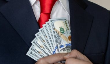 oameni afaceri bani dolari costum business