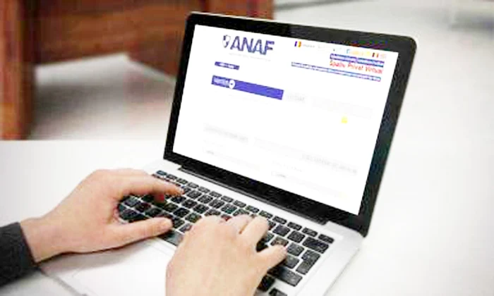 Site-ul ANAF deschis pe un laptop
