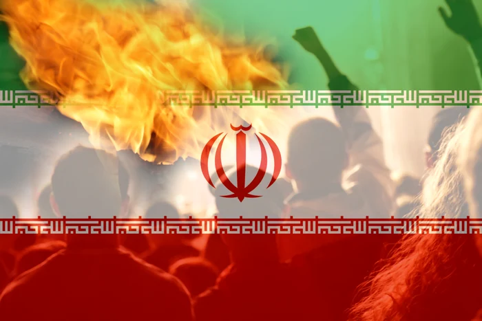 Steagul iranian cu flăcări în fundal FOTO shutterstock
