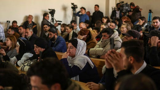 Åhörare i rättssalen i Aleppo.