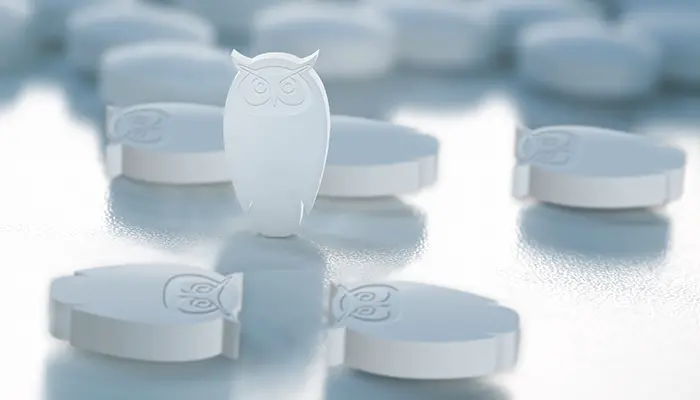 Kloka ugglor som tabletter.