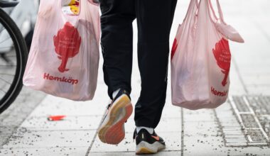 Specialists Alex Weitzman, left, and Meric Greenbaum work on the floor of the New York Stock Exchange, Thursday, Dec. 11, 2025. (AP Photo/Richard Drew)  NYRD405