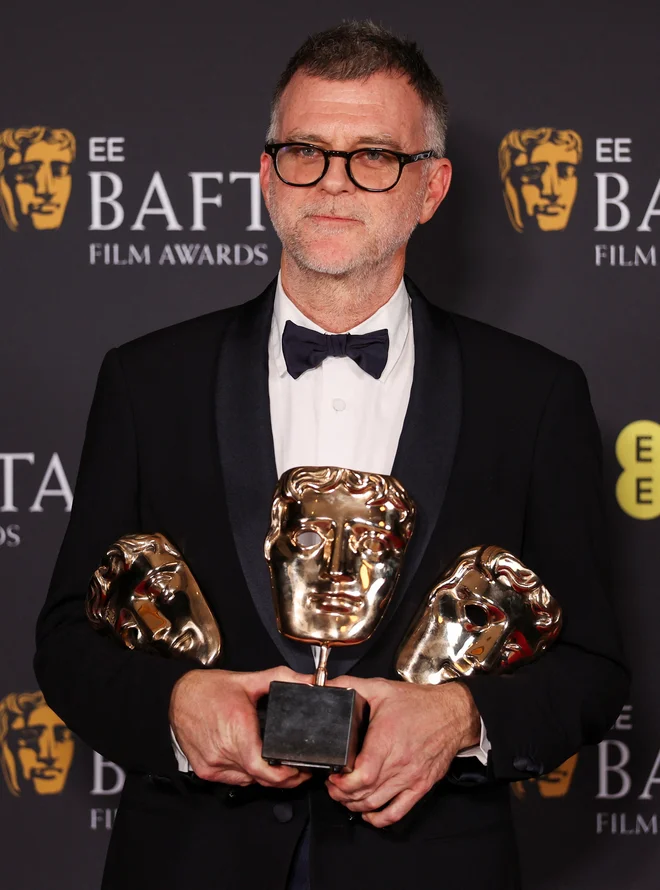 Paul Thomas Anderson je odšel polnih rok. FOTO: Suzanne Plunkett/Reuters