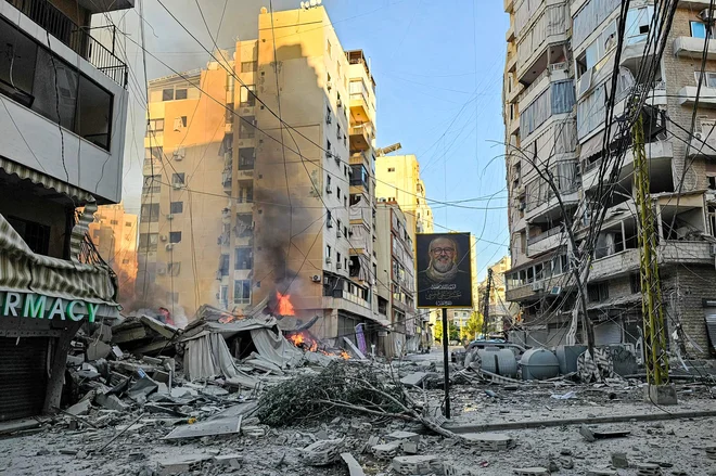 Posledice izraelskega napada v Bejrutu. FOTO: - Afp