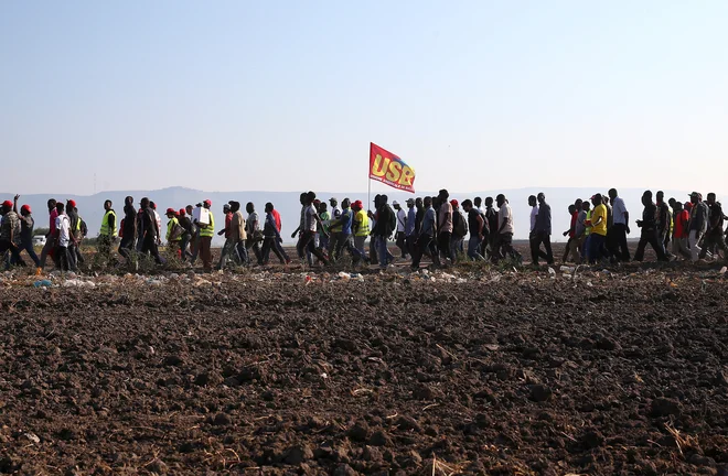 Protesti migrantov proti kaporalatu leta 2018. FOTO: Alessandro Bianchi/Reuters