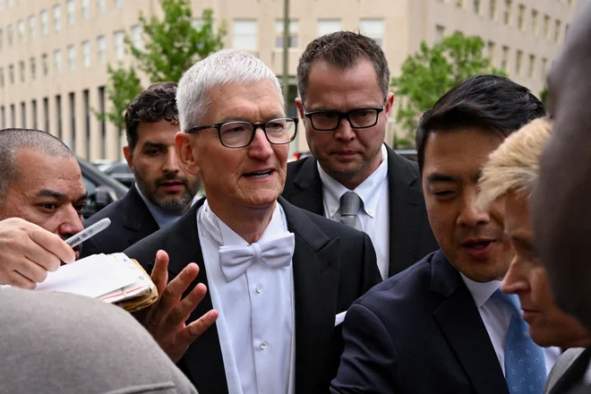 Tim Cook bo v delegaciji ZDA. FOTO: Matt Mcclain/Reuters