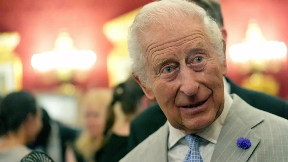 A bead of sweat runs down the cheek of Britain's King Charles as he attends a London Climate Week reception at St James's Palace, London, Britain, June 24, 2026. Yui Mok/Pool via REUTERS