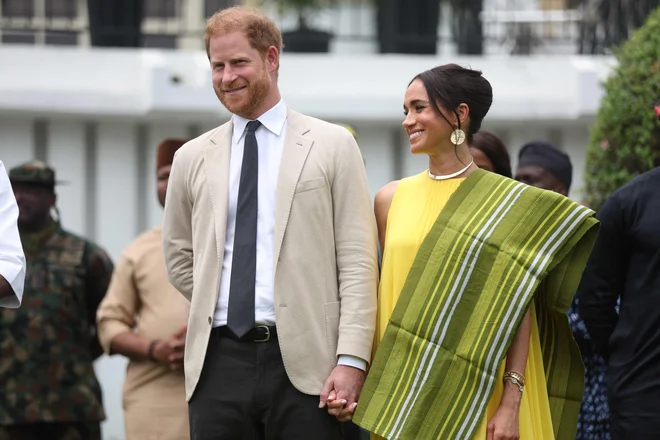 Harry in Meghan sta pred dvema letoma šla tudi v Nigerijo. FOTO: Kola Sulaimon/AFP