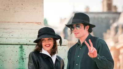 Lisa Marie Presley and Michael Jackson pose at the