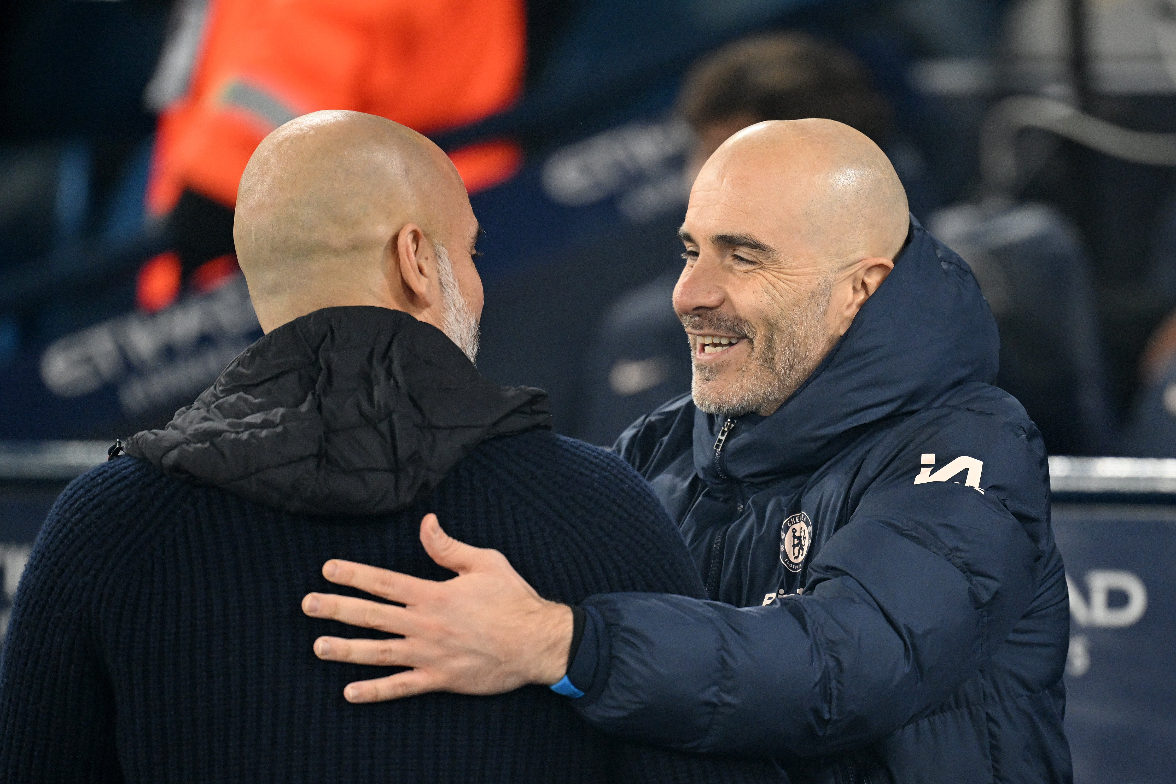 Enzo Maresca (right) is the current favourite to replace Guardiola