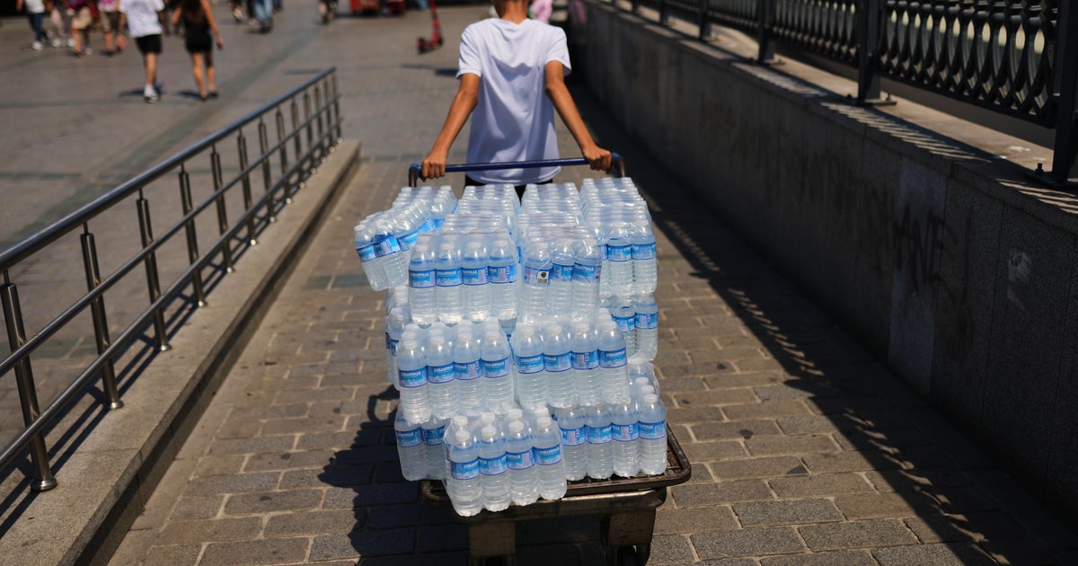 France bans some outdoor drinking as heat wave threatens Europe