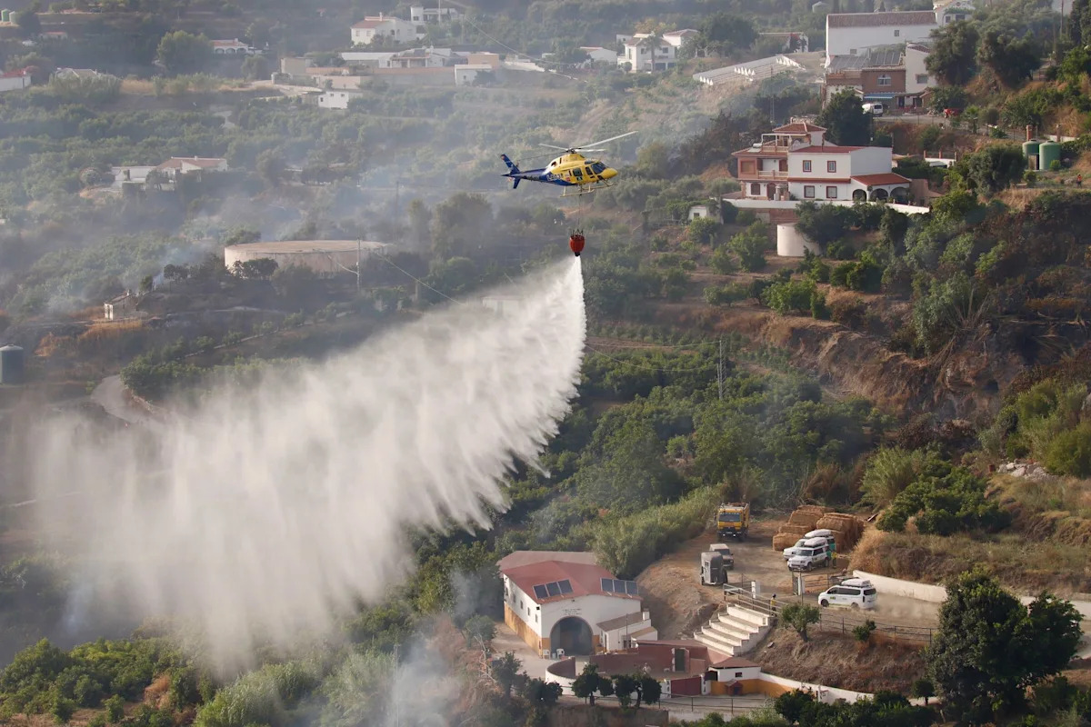 Spanish firefighters battle fast-moving blaze near Madrid