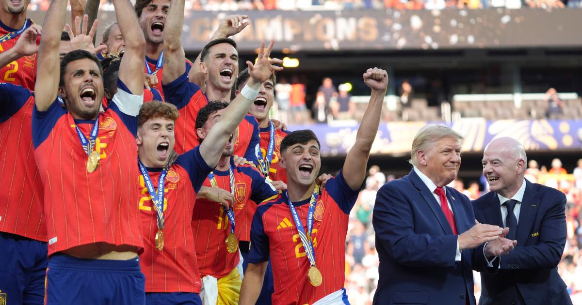 Trump lingers awkwardly long after giving World Cup trophy to Spain