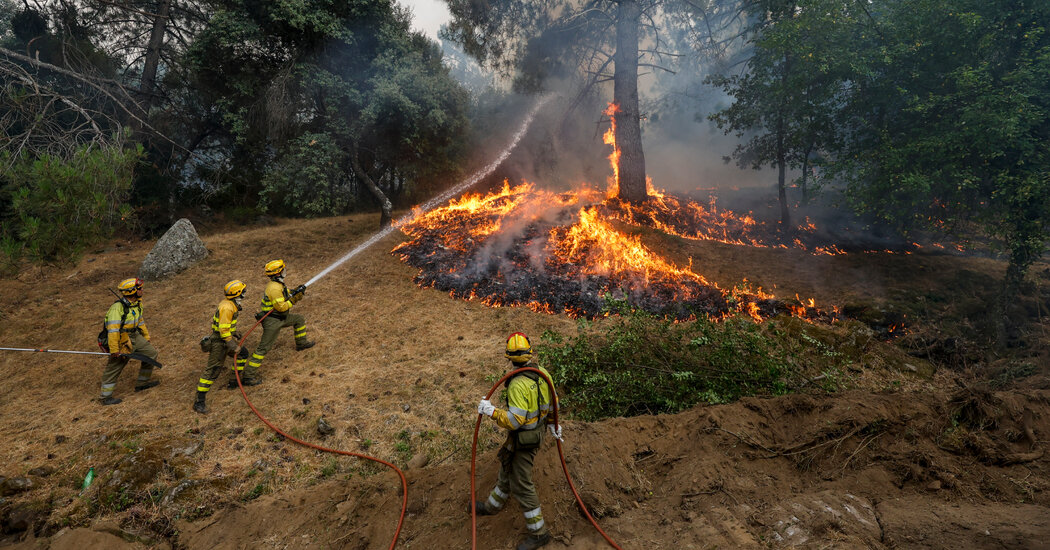 Hundreds of Thousands Flee as Fires Rage in Spain and France