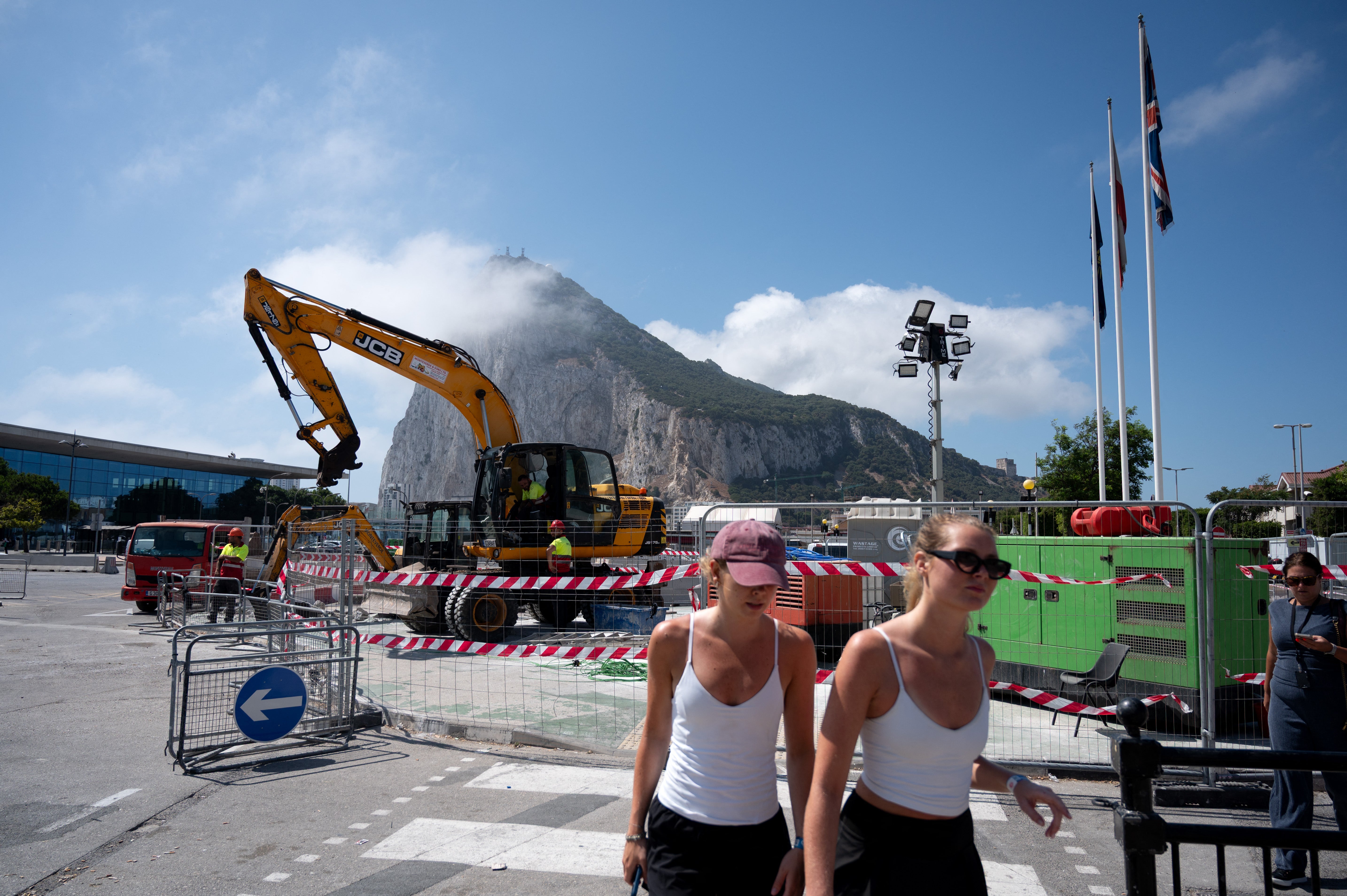 The Rock of Gibraltar is seen in the background as construction to remove the border between Spain and Gibraltar is seen in the British territory of Gibraltar, on June 29, 2026