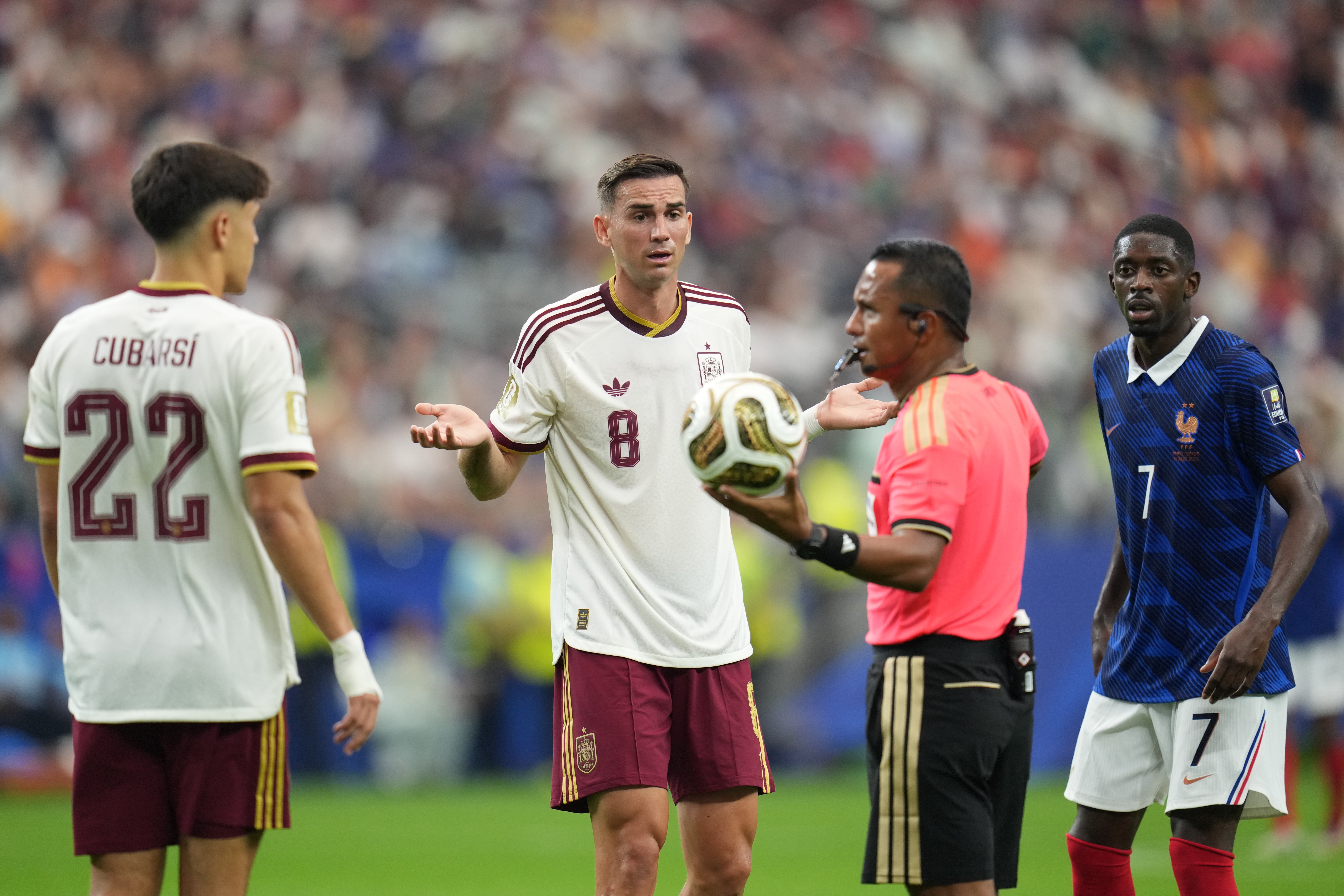 Spain's Fabian Ruiz (8) protests to referee Ivan Barton