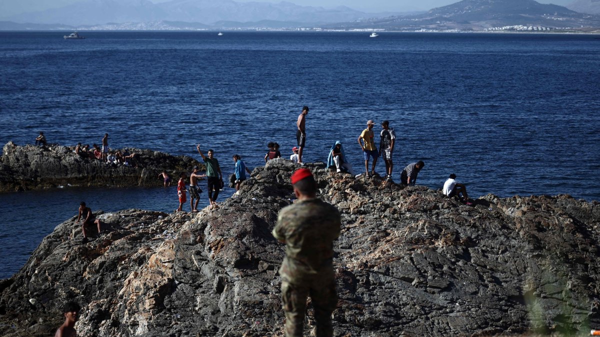 Ceuta migrant rush deaths hit 72 as Spain erects floating barrier