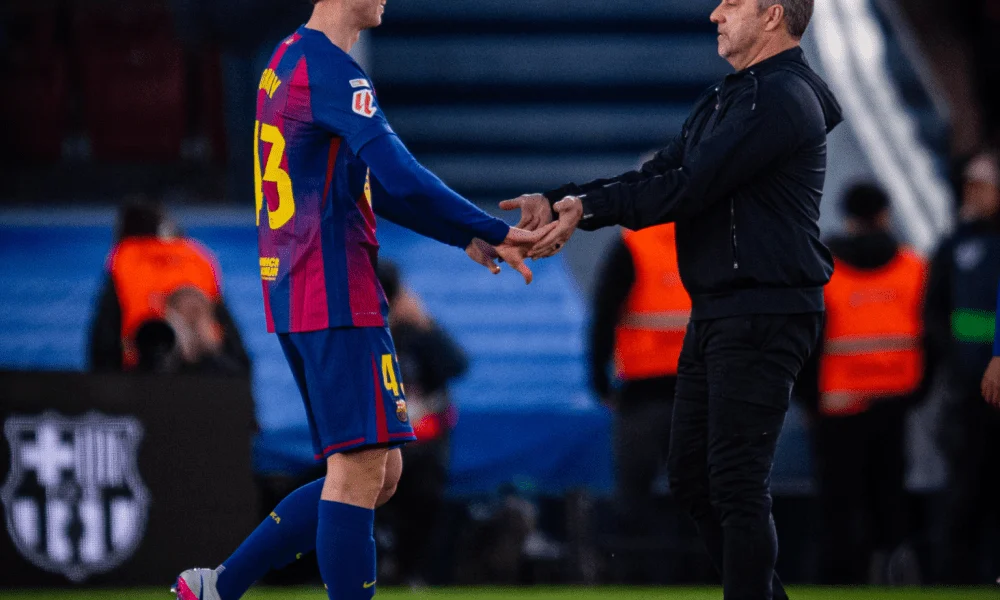 Tommy Marques and Hansi Flick of Barcelona