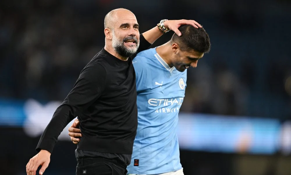 Pep Guardiola and Rodri of Manchester City