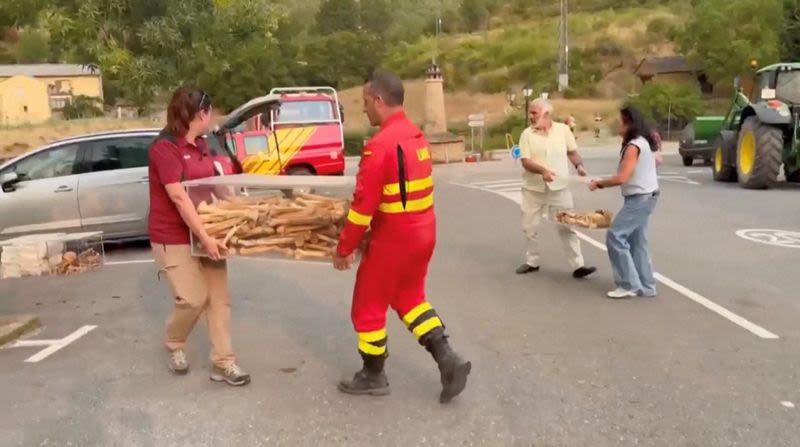 Spain removes remains of 11th century kings from monastery as wildfire rages