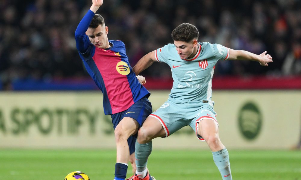 Marc Casado of FC Barcelona and Julian Alvarez of Atletico Madrid