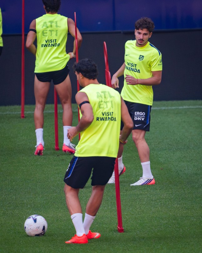 Julian Alvarez of Atletico de Madrid (R) trains with his teammates during a session ahead of their opening LaLiga EA Sports match against Malaga CF at Estadio Riyadh Air Metropolitano in Madrid, Spain, on August 18, 2026.