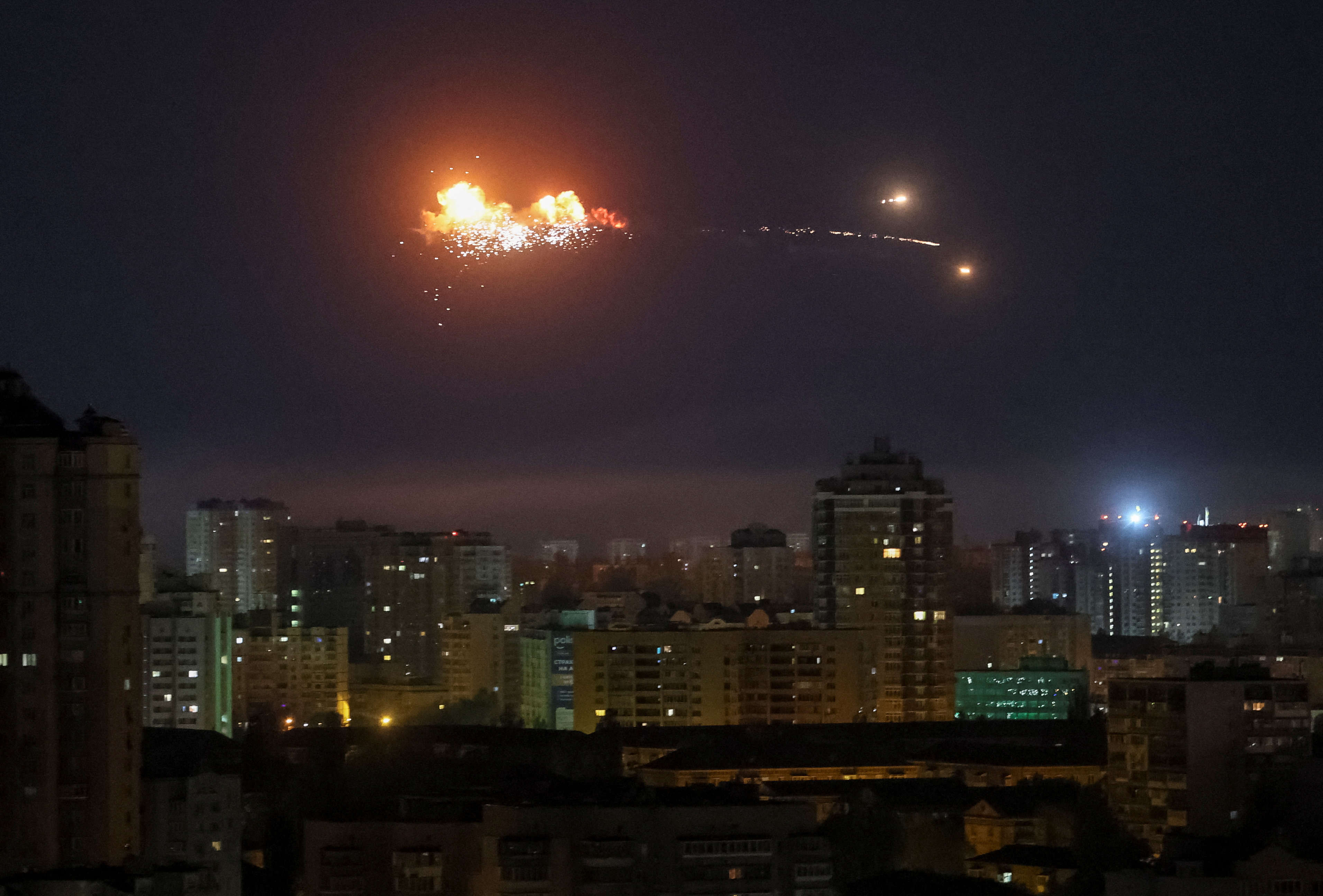A ballistic missile explodes over the capital