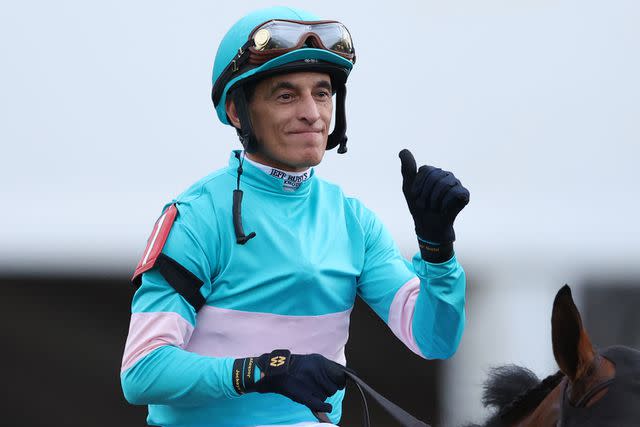 Patrick Smith/Getty John Velazquez celebrates after winning the 148th Running of the Preakness Stakes on May 20, 2023 in Baltimore, Maryland.