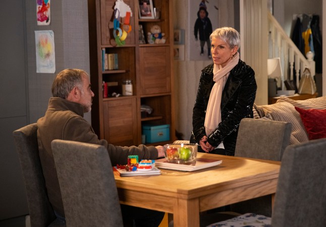 Debbie Webster speaking to Kevin Webster over the dining table in Coronation Street.