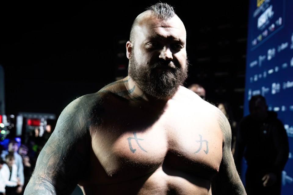 Hafþór Júlíus Björnsson, shirtless, with tattoos.