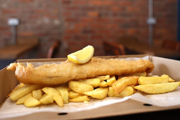 The owners of the Chips @ No.8 fish and chip shop in Prestwich have been forced to explain a recent price hike
