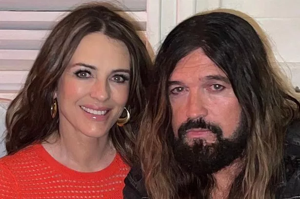 Billy Ray Cyrus told fans to expect more photos of him with new partner Liz Hurley