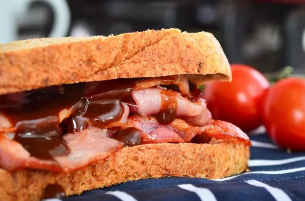 Delicious bacon sandwich with lashings of brown sauce