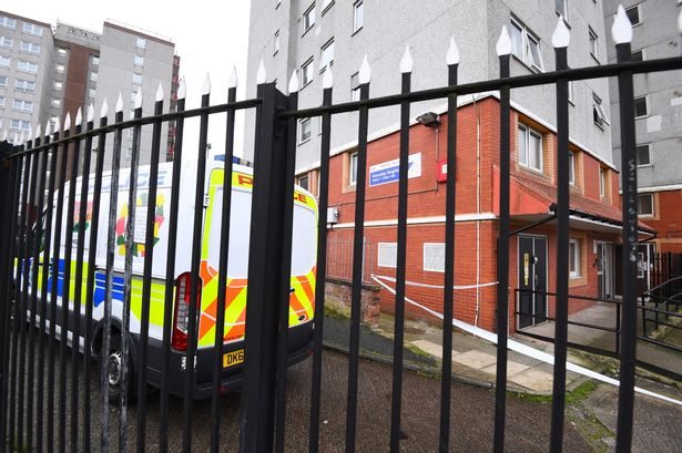 Cordon outside Knowsley Heights after woman killed