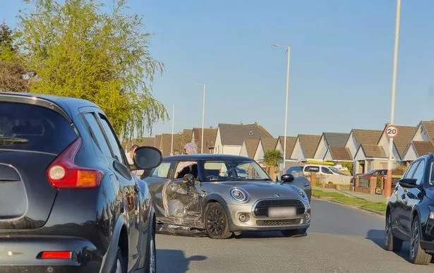 A grey mini was also badly damaged in the crash