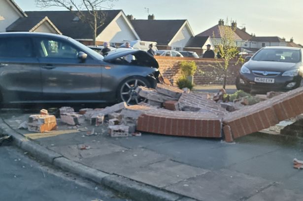 A car ploughed through a brick wall on Fylde Road, Southport this evening