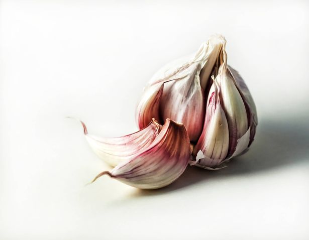 Garlic bulb on white background.