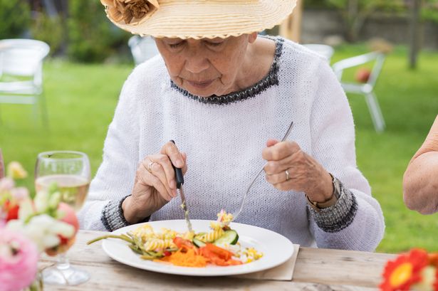 Woman eating meal