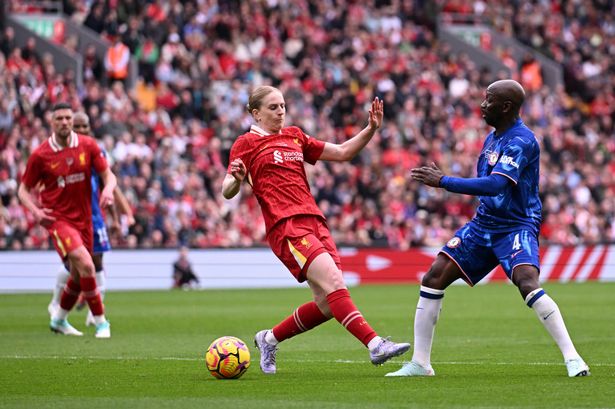 LIVERPOOL, ENGLAND - MARCH 22: (THE SUN OUT, THE SUN ON SUNDAY OUT) Claude Makelele of Chelsea Legends is challenged by Natasha Dowie of Liverpool Legends during the Legends Charity Match between Liverpool Legends and Chelsea Legends at Anfield on March 22, 2025 in Liverpool, England. (Photo by LFC Foundation/Liverpool FC via Getty Images)