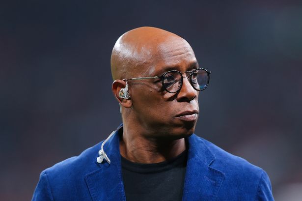 Pundit Ian Wright looks on during a match