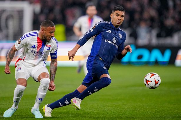 Casemiro competes for possession during Manchester United's clash with Lyon.